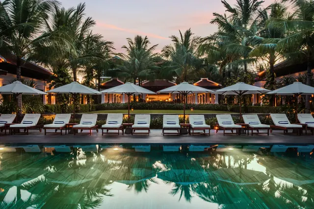 The pool terrace with loungers and parasols